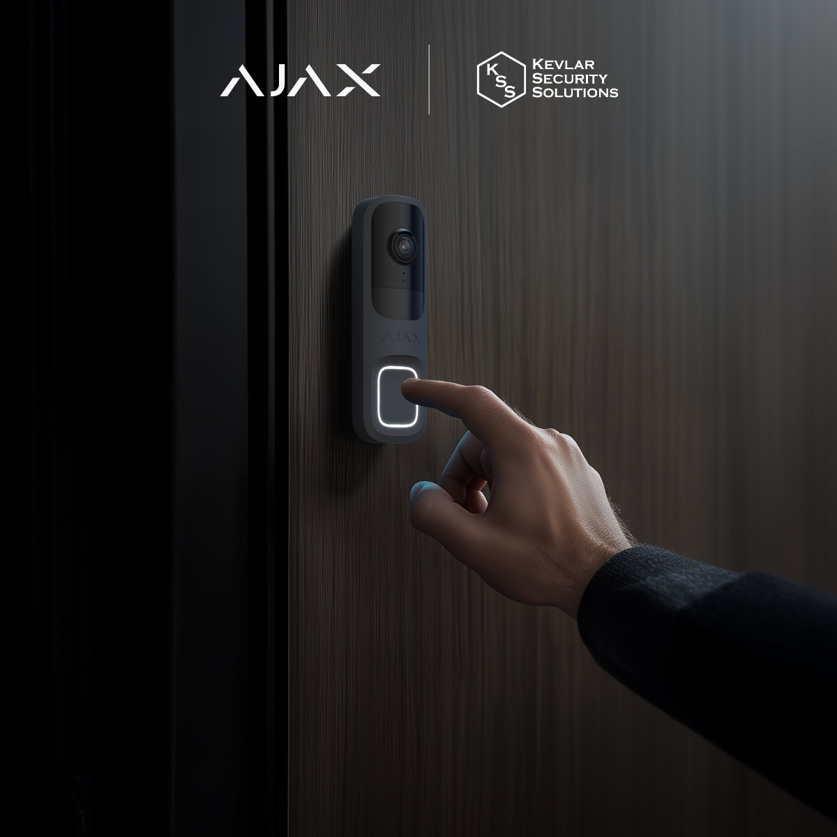 Hand pressing an Ajax DoorBell video doorbell on a timber door